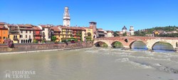 Verona színes házai az Adige folyó partján